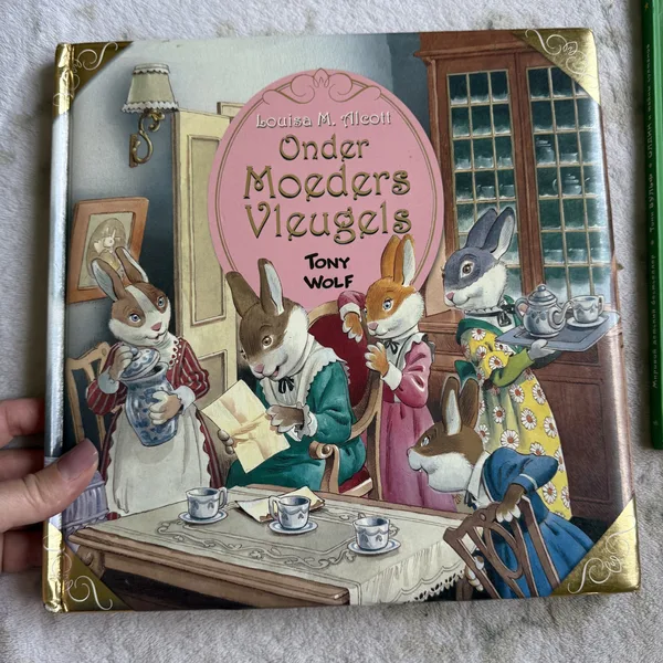 Onder Moeders Vleugels нідерландською мовою